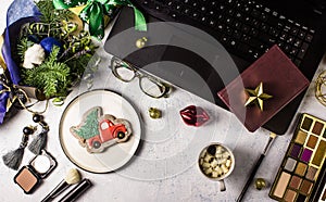 Flat lay styled office desk with laptop, winter bouquet with Nob