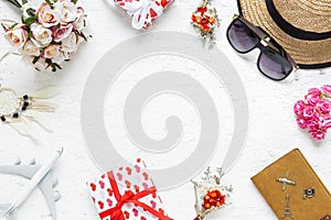 Flat lay table top view of decorations valentine`s day & summer travel hoilday background concept. Overhead shot items plan to