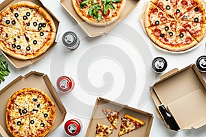 A flat lay of takeaway pizza boxes and soda cans arranged on a clean
