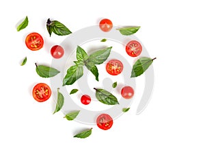 Flat lay of tomatoes and green basil