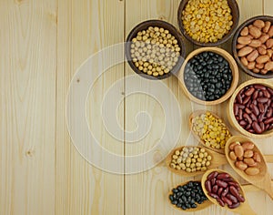 Flat lay,top view assorted beans on wooden background