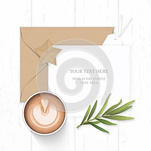 Flat lay top view elegant white composition paper brown kraft envelope star shape craft tag tarragon leaf and coffee on wooden