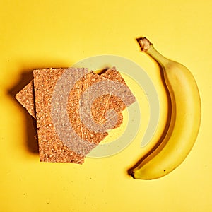 Flat lay. Top view. Healthy food. Fresh banana and healthy rusks