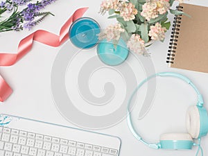 Flat lay, top view office table desk frame. feminine desk workspace with laptop, watch on white background.Love concept top view