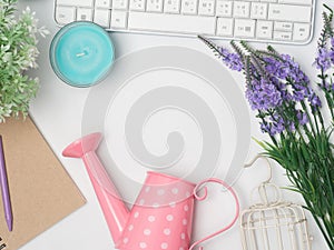 Flat lay, top view office table desk frame. feminine desk workspace with laptop, watch on white background.Love concept top view