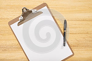 Flat lay, top view office table desk. Workspace with blank clip board and pen. Mock up, copy space