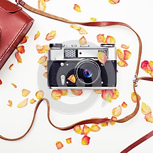 Flat lay. Top view. Old film camera. White background close-up. Vintage photo