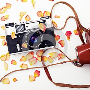 Flat lay. Top view. Old film camera. White background close-up. Vintage photo