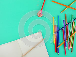 Flat lay,top view stationery on green background