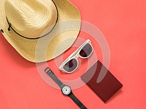 Flat lay traveler accessories on pink background with blank space for text. Top view travel or vacation concept. Summer