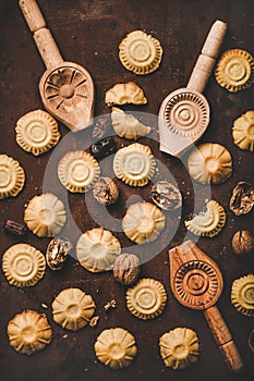 Flat-lay of Turkish traditional Hatay semolina cookies with walnut filling photo