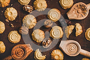 Flat-lay of Turkish traditional Hatay semolina cookies with walnut filling photo