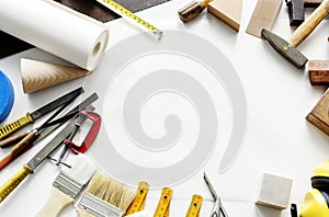 Flat lay of various technician tools isolated on white background