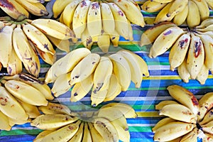 Flat lay view of bunch of bananas for sale in Rarotonga market C