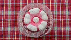 Flat lay view of putu ayu, a steamed coconut cupcake from Indonesia