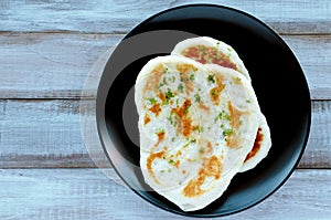 Flat lay view of traditional Indian Naan flatbread