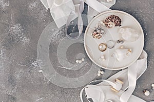 Flat lay wedding rings on shell, sea wedding concept decorations, Wedding symbols