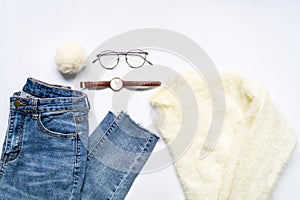 Flat lay of woman clothes and accessories set with glasses, watch.