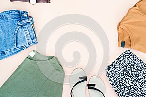 Flat lay of woman clothes and accessories set with shoes, watch.