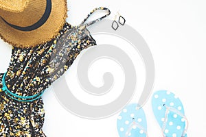 Flat lay of woman dress with accessories and sandals on white background, Beauty and beach items