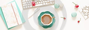 Flat lay women`s office desk banner. Female workspace with laptop,