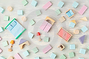 Flat lay with wooden  blocks in pastel colors. Eco friendly, zero waste, plastic free, educational, gender neutral toys for