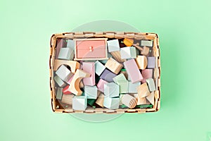 Flat lay with wooden  blocks in pastel colors. Eco friendly, zero waste, plastic free, educational, gender neutral toys for