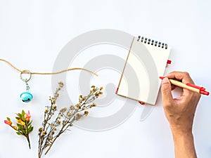 Flat Lay of workspaces with dry leaf