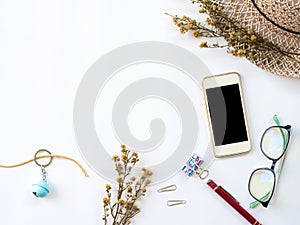 Flat Lay of workspaces with dry leaf