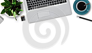 Flat layout of modern laptop, cup of coffee, pencil, notepad, flash card, flowerpot with green plant isolated over white backgroun