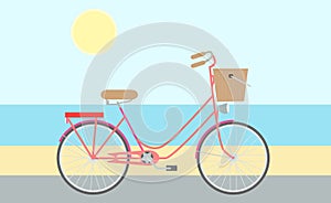 Flat model of bicycle on the road on the seashore