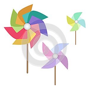 Flat multicoloured pinwheels on white background