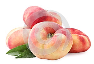 Flat peaches with green leaves on a white background. Isolated