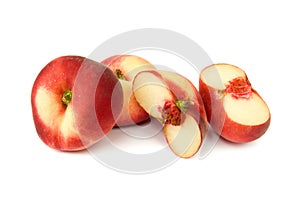 Flat peaches with sections photo