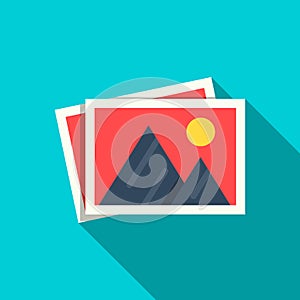 Flat pictures icon in flat stule with shadow isolated on blue background. Mountains and sun on paper photos.