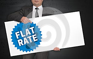 Flat rate poster is held by businessman