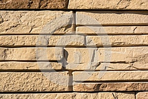 Flat rocks layered to form a solid wall