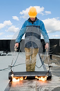 Flat roof covering works