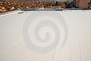 Flat roof with hot air welded pvc membrane waterproofing for ballasted system