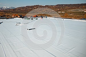 Flat roof with hot air welded pvc membrane waterproofing for ballasted system photo