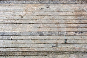 Flat texture and background of horizontal gray thin solid wooden planks - old, dry and dusty