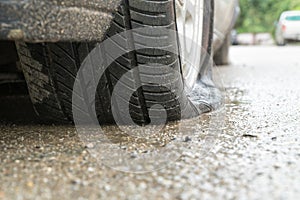 Flat tire car in rainy day