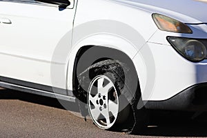 Flat Tire - Rim on Asphalt