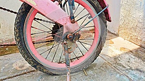 a flat tire on an unused bicycle