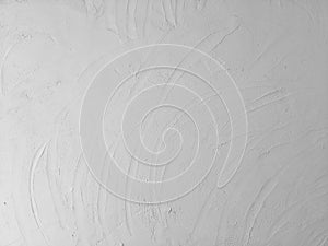 Flat whiteâ€‹ paintâ€‹ concreteâ€‹ wall textureâ€‹ withâ€‹ patternâ€‹ fromâ€‹ plastering forâ€‹ abstract background.