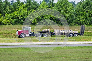 Flatbed 18-Wheeler Carrying Load of Stone For Construction