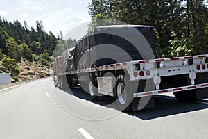 Flatbed Semi Truck with Freight photo