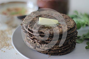 Flatbread with finger millet and fenugreek leaves served with masala curd. It is also called Nachni methi thepla, a healthy and