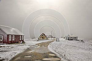 Snow and sun on Flatey island