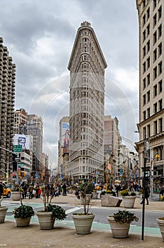 Flatiron Building New York City with People and Plants in forefront